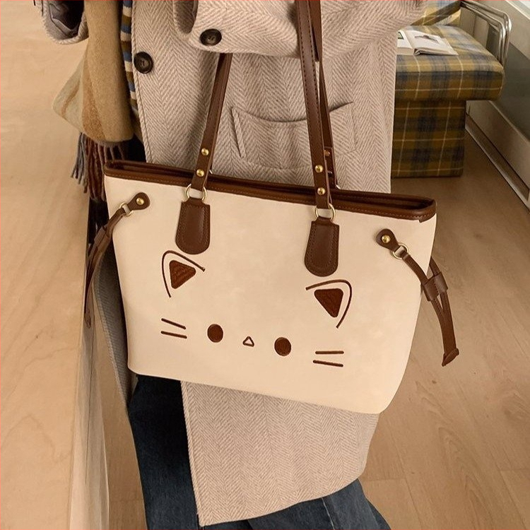 Taška cez rameno typu tote s motívom mačky, PU materiál, kapacita do 20 l, zakrivený popruh, unisex