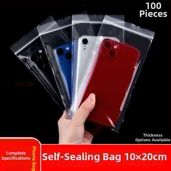 Storas, skaidrus atsparus vandeniui ir dulkių apsaugos kišenė su savisaugos užsegimu, skirta mobiliojo telefono pakuotei; medžiaga: naujasis PE; užsegimo ilgis: 1–1,5 cm; pritaikomas