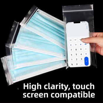 Storas, skaidrus atsparus vandeniui ir dulkių apsaugos kišenė su savisaugos užsegimu, skirta mobiliojo telefono pakuotei; medžiaga: naujasis PE; užsegimo ilgis: 1–1,5 cm; pritaikomas