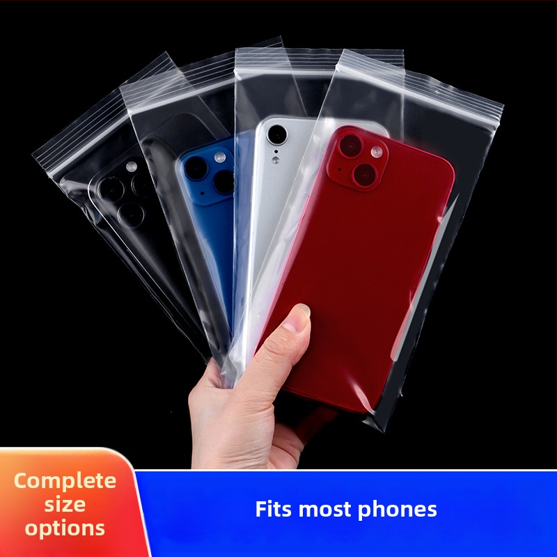 Storas, skaidrus atsparus vandeniui ir dulkių apsaugos kišenė su savisaugos užsegimu, skirta mobiliojo telefono pakuotei; medžiaga: naujasis PE; užsegimo ilgis: 1–1,5 cm; pritaikomas