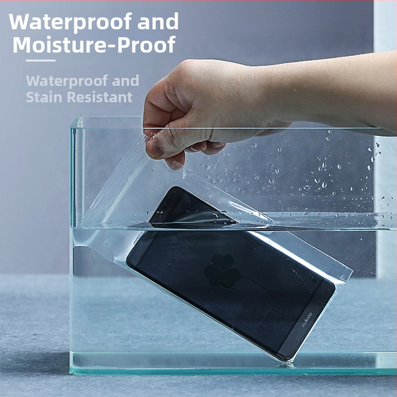 Jutiklinio ekrano apsauginė dėžutė maišelis mobiliojo telefono dėklui, skaidrus atsparus vandeniui užsegamas maišelis (Medžiaga: PE; Prekė: Guan Heng; Naudojimas: mobiliojo telefono dėklo pakavimas; Užsegimo ilgis: 1,5 cm; Leidimo numeris: Hebei XK16-204-0