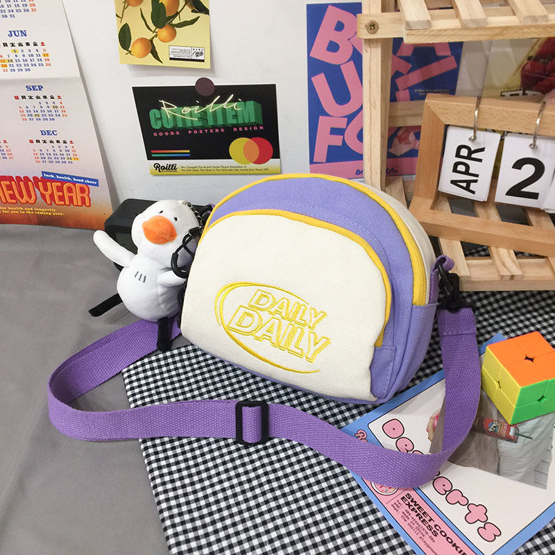 Mala platnena crossbody torbica, korejski Harajuku Ulzzang stil, kružnog oblika, kontrastne boje, 2023