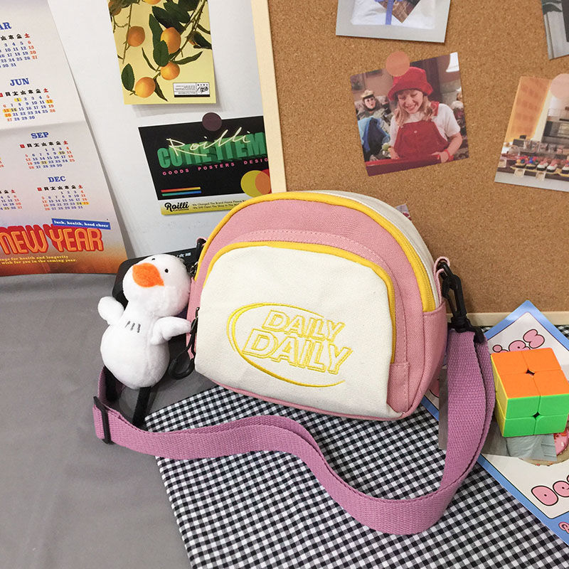 Mala platnena crossbody torbica, korejski Harajuku Ulzzang stil, kružnog oblika, kontrastne boje, 2023