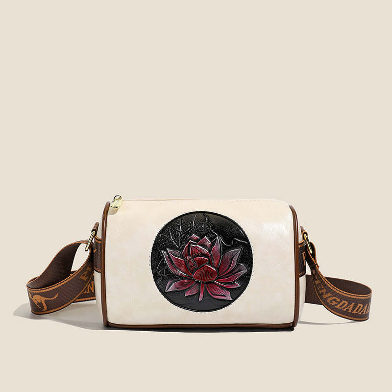 Ženska torbica preko ramena crossbody – cilindričnog oblika, PU materijal, zatvaranje na zip, unutarnji džep sa zipom
