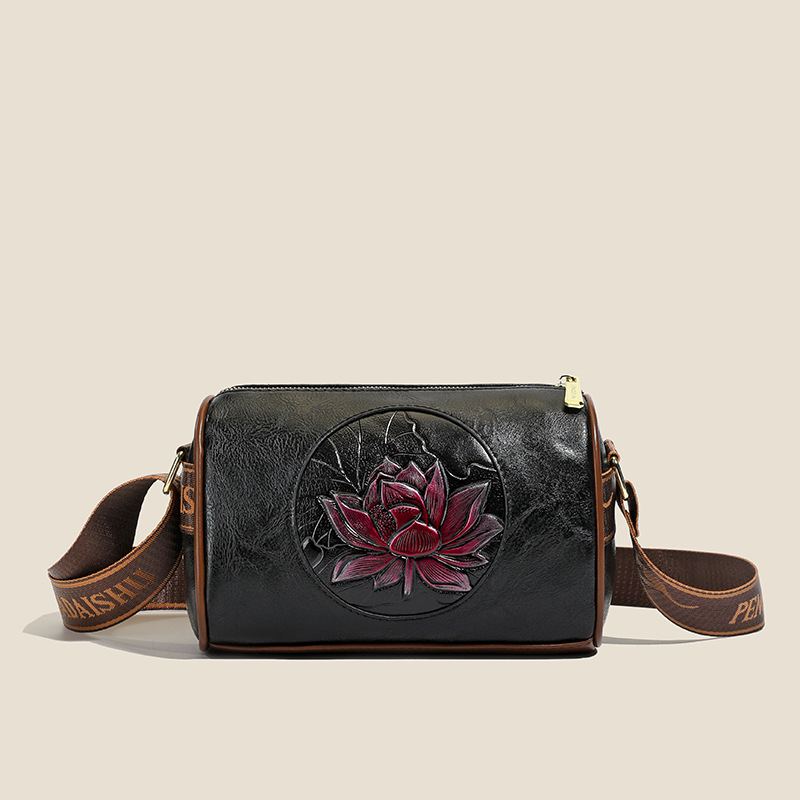 Ženska torbica preko ramena crossbody – cilindričnog oblika, PU materijal, zatvaranje na zip, unutarnji džep sa zipom