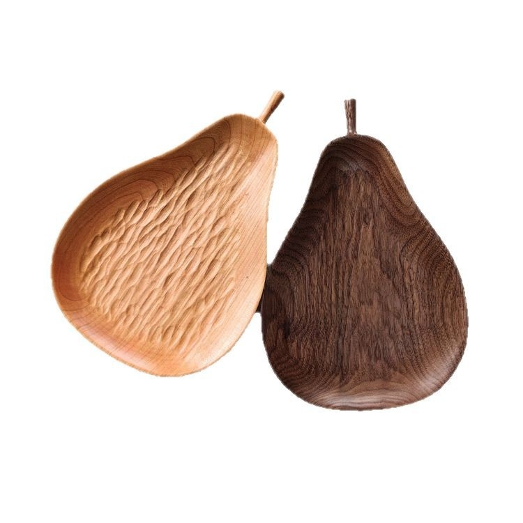 Drvena ploča u obliku kruške, ručno rađena, s teksturiranom površinom, od masivnog drveta (Materijal: sjevernoamerički orah; Oblik: kruška; Površina: teksturirana; Izrada: masivno drvo; Stil: moderni minimalizam)