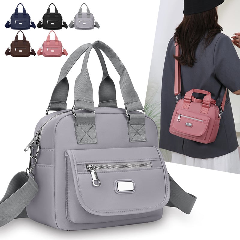 Ženska crossbody torba od Oxford tkanine, horizontalni kvadratni oblik, zatvaranje na zip, unutarnja džep s zipom, jedna naramenica