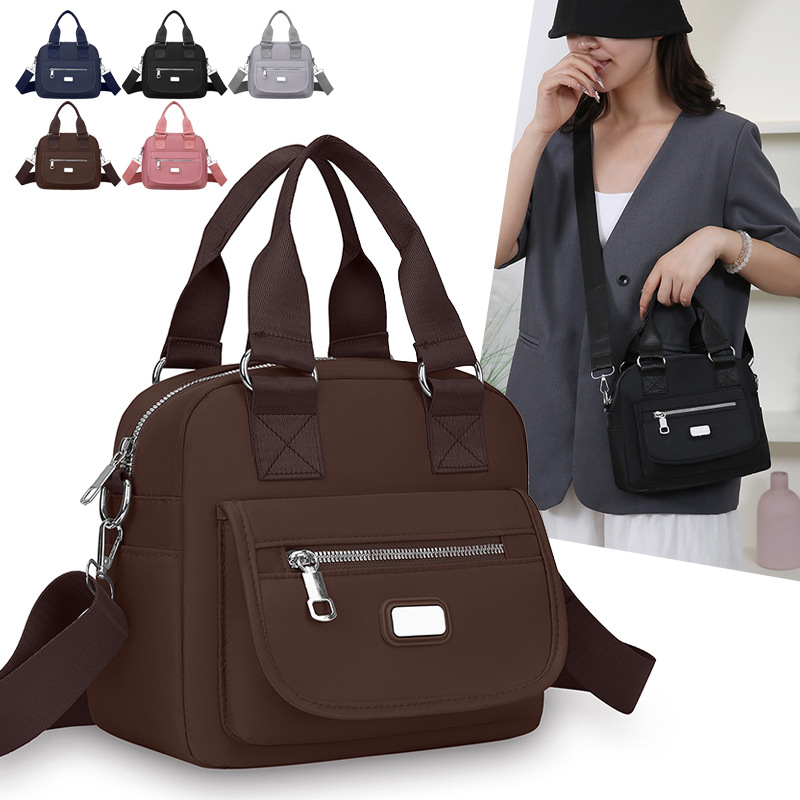 Ženska crossbody torba od Oxford tkanine, horizontalni kvadratni oblik, zatvaranje na zip, unutarnja džep s zipom, jedna naramenica