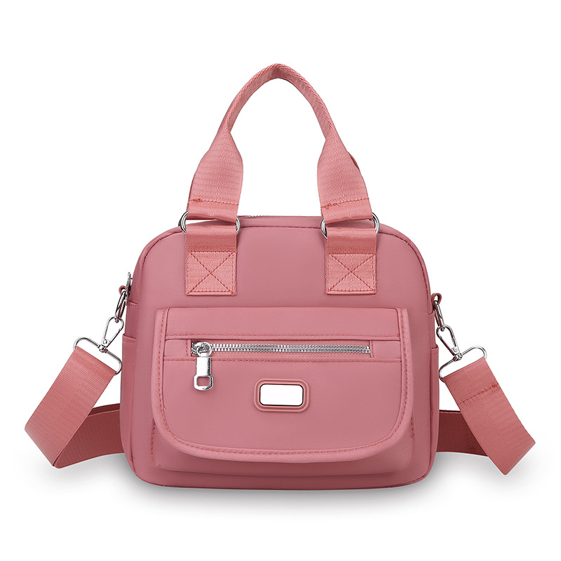 Ženska crossbody torba od Oxford tkanine, horizontalni kvadratni oblik, zatvaranje na zip, unutarnja džep s zipom, jedna naramenica