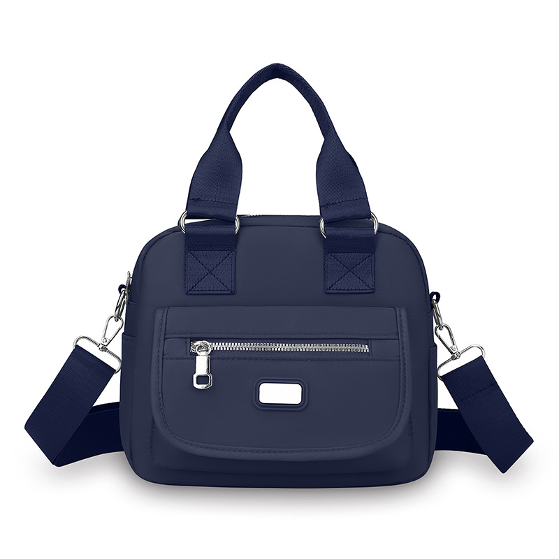 Ženska crossbody torba od Oxford tkanine, horizontalni kvadratni oblik, zatvaranje na zip, unutarnja džep s zipom, jedna naramenica