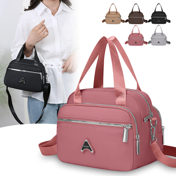 Ženska torbica preko ramena, kvadratnog oblika od Oxford tkanine, zatvarač, unutarnja organizacija: džep za telefon i laminirani džep sa zatvaračem, podstava Oxford