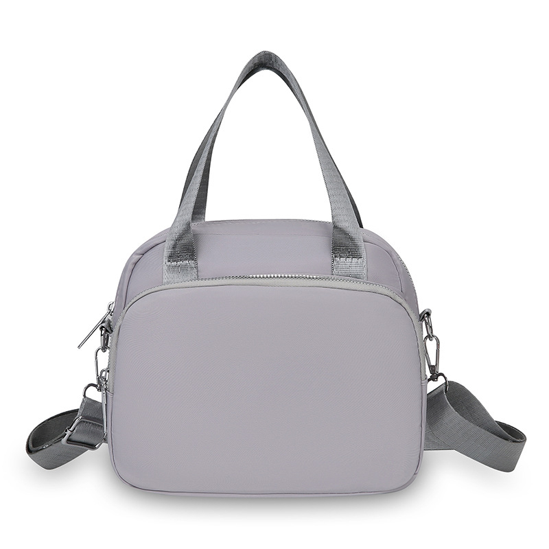 Ženska torbica preko ramena, kvadratnog oblika od Oxford tkanine, zatvarač, unutarnja organizacija: džep za telefon i laminirani džep sa zatvaračem, podstava Oxford