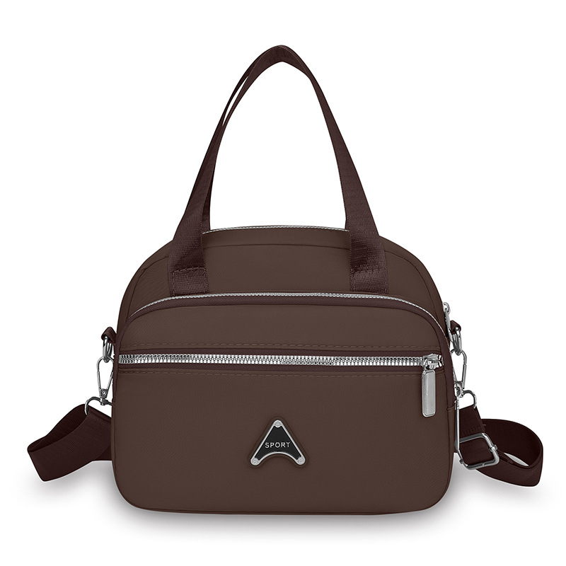 Ženska torbica preko ramena, kvadratnog oblika od Oxford tkanine, zatvarač, unutarnja organizacija: džep za telefon i laminirani džep sa zatvaračem, podstava Oxford