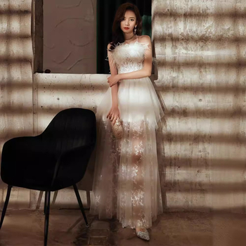 Večernja haljina bez rukava, dekolte tip tube, A-linijski kroj, duga suknja, poliester.