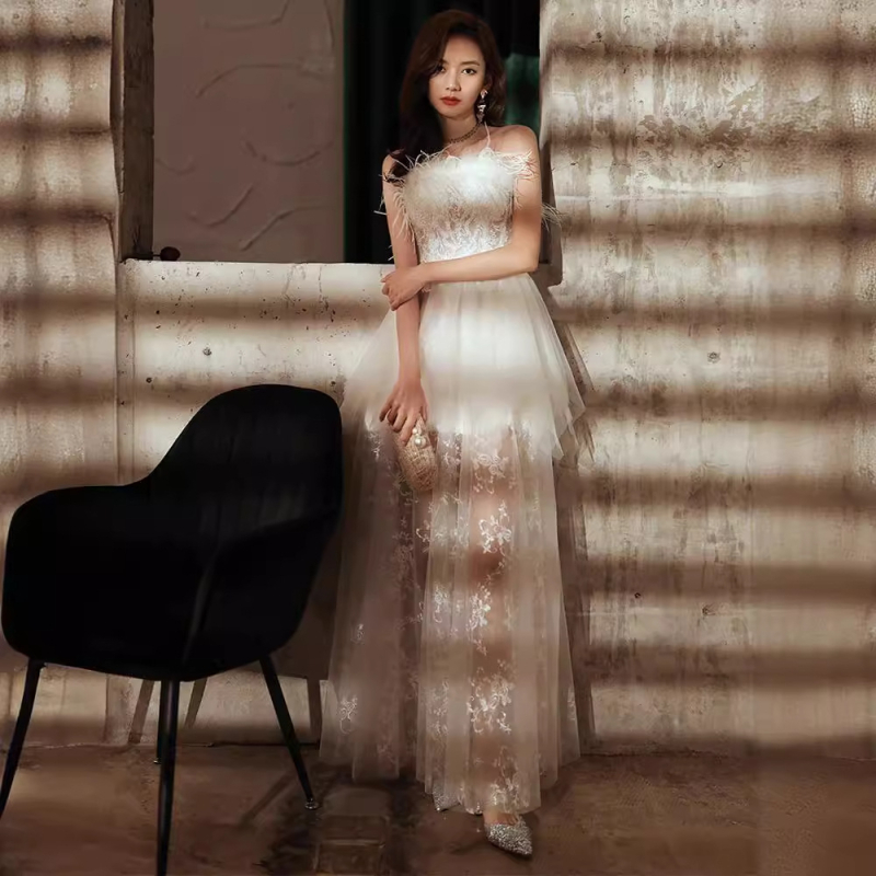 Večernja haljina bez rukava, dekolte tip tube, A-linijski kroj, duga suknja, poliester.