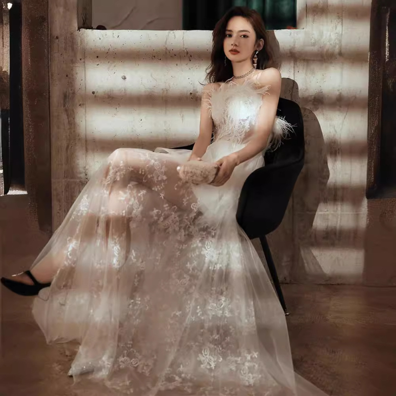 Večernja haljina bez rukava, dekolte tip tube, A-linijski kroj, duga suknja, poliester.