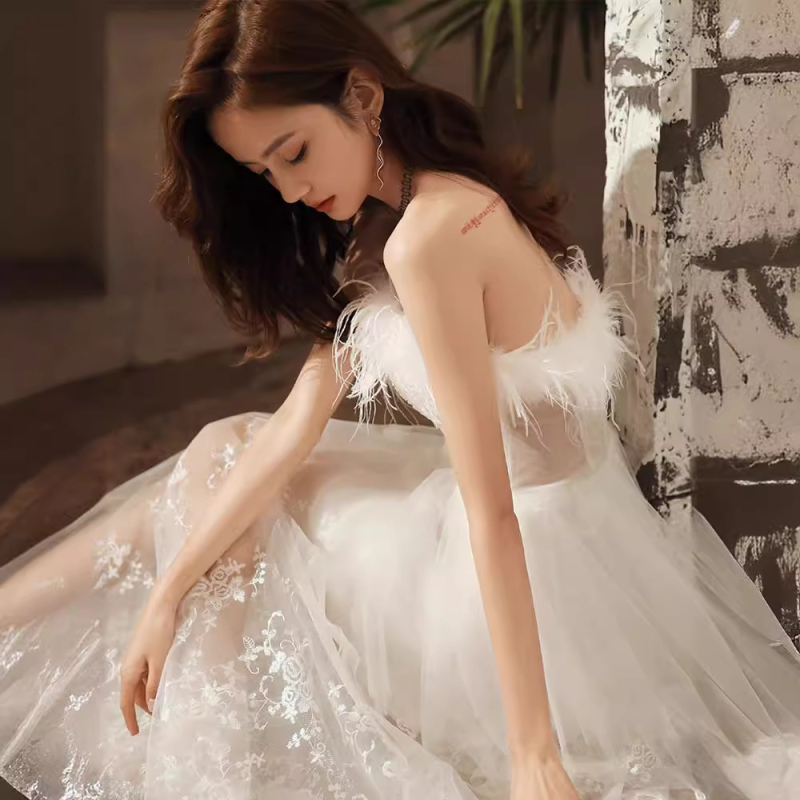 Večernja haljina bez rukava, dekolte tip tube, A-linijski kroj, duga suknja, poliester.