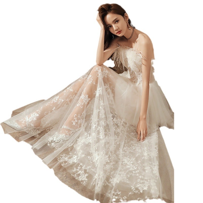 Večernja haljina bez rukava, dekolte tip tube, A-linijski kroj, duga suknja, poliester.