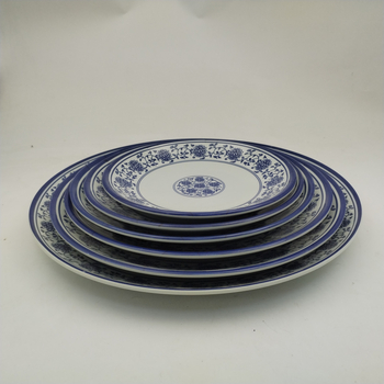 Melaminska tanjura s cvjetnim uzorkom, kružni oblik, reljefna površina