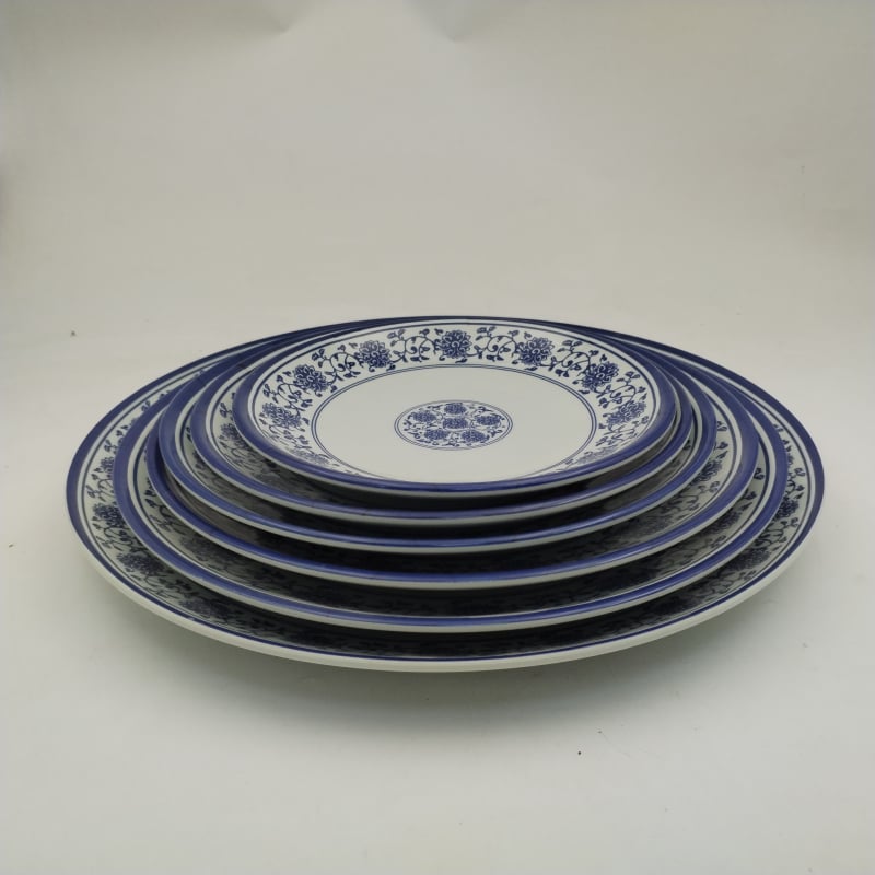 Melaminska tanjura s cvjetnim uzorkom, kružni oblik, reljefna površina