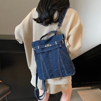 Denim ruksak s vintage izgledom, studentska putna torba, nosi se ručno ili crossbody (Materijal: Denim • Ljeto 2025 • Podstava: Poliester • Način otvaranja: Pokriveno • Otporan na habanje)