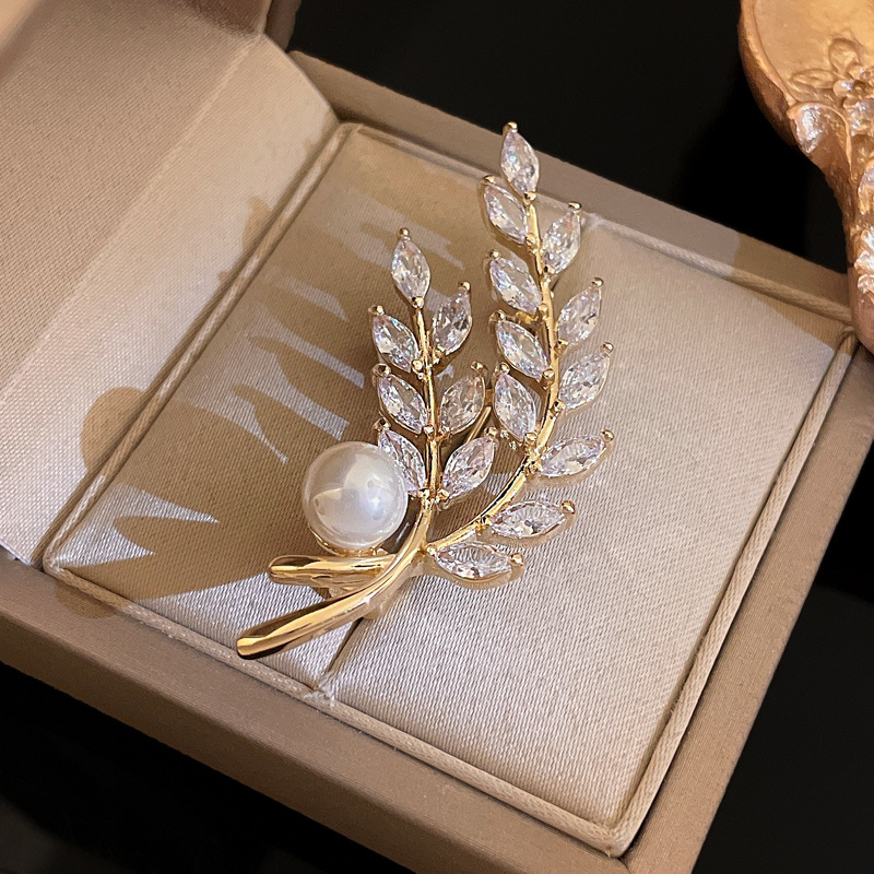 Broška s cirkonima u obliku pšenice, s postavljanjem bisera, za žene