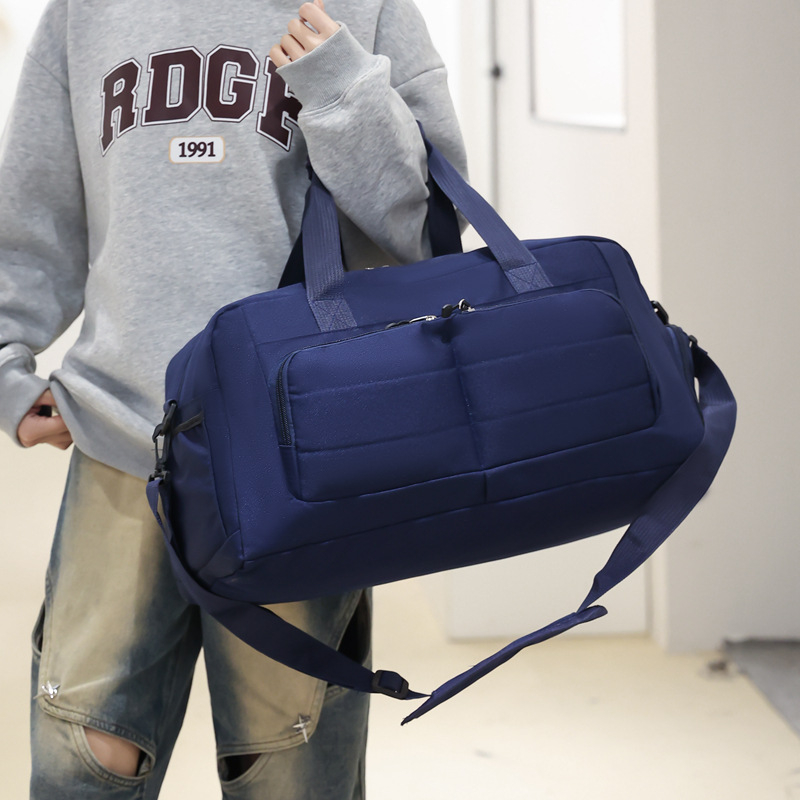 Sportska torba za putovanje i fitness s odjeljivanjem suho/mokro, otporan Oxford materijal, crossbody dizajn, kapacitet 36–55 L, unisex