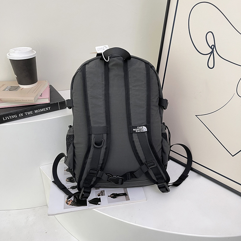 Unisex nylon ruksak za putovanja i školu, kapacitet do 20 L, kompatibilan s 8-inčnim prijenosnim računalom, prozračne zakrivljene naramenice, podstava od poliestera, street stil