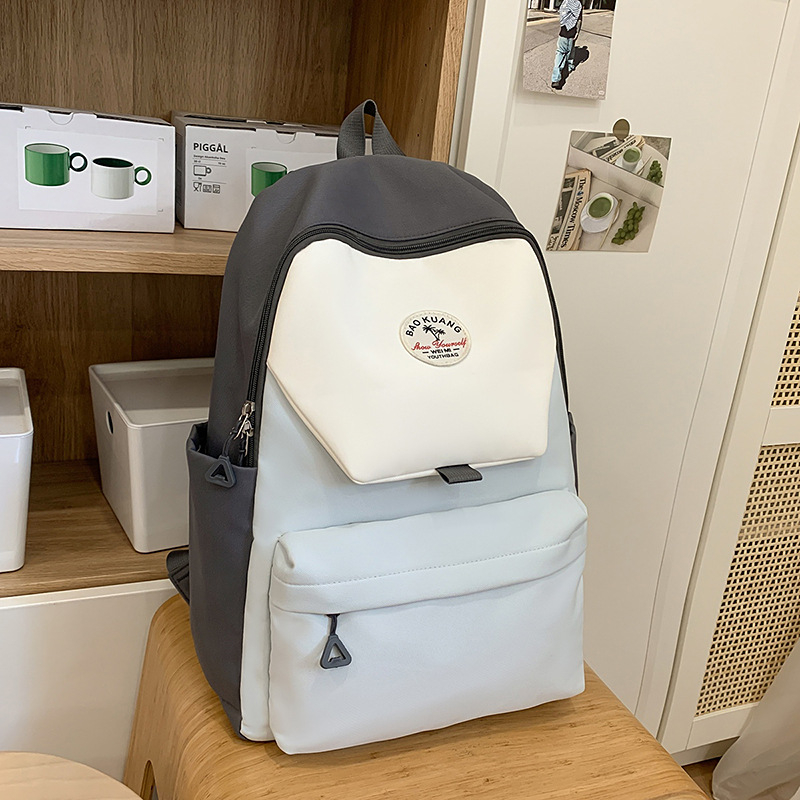 Unisex ruksak za školu i putovanje, najlon materijal, gradski minimalistički stil, kapacitet 20–35 L, može smjestiti 15 inčni prijenosno računalo, prozračni naramenice s jastukom zraka