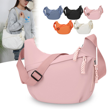 Nylon keresztpántos táska, dumpling alakú, zip nyitás, poliészter bélés, laminált belső zseb