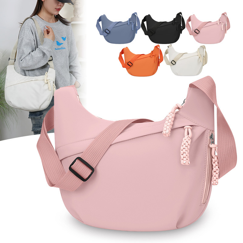 Nylon keresztpántos táska, dumpling alakú, zip nyitás, poliészter bélés, laminált belső zseb