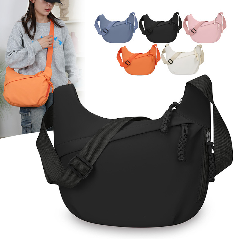 Nylon keresztpántos táska, dumpling alakú, zip nyitás, poliészter bélés, laminált belső zseb