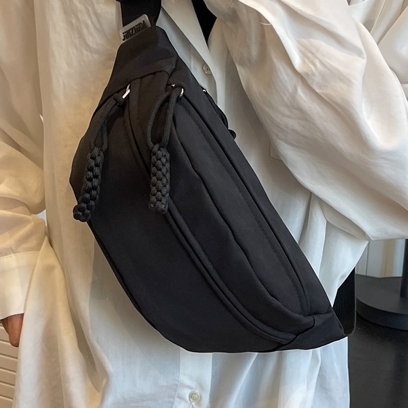 Vászon crossbody táska nylon béléssel, cipzáras zárás, ovális alak, egy vállpánt