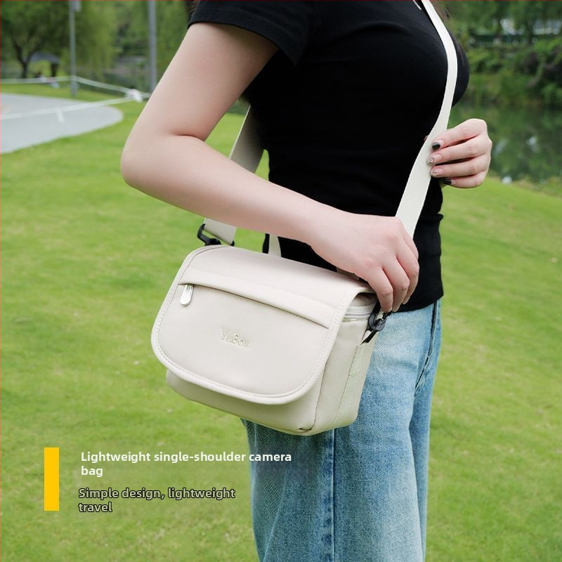 Kameras soma ar crossbody siksnu, PU materiāls, rokassomas stilā, saderīga ar Canon R50, Sony ZV-E10 un Fujifilm bez spoguļkameras, 2025. gada pavasara izlaidums, mājas uzglabāšanai.