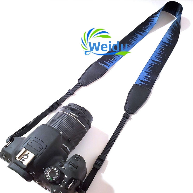 Kameros dirželis su greito atleidimo sagtėmis, reguliuojamas ilgis, modelis 750d, apkrova 10-20 kg, suderinamas su Nikon, Canon, Sony ir be veidrodinių kamerų