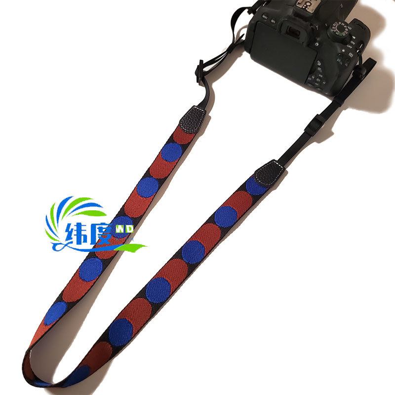 Kamera diržas iš kanvado su taškuotu dizainu, reguliuojamas kryžminės nešiojimo su greitu atleidimu, poliesteris, modelis 750d, 6 sagenelių, apkrova 10–20 kg, suderinamas su Canon/Nikon/Sony/Mirrorless