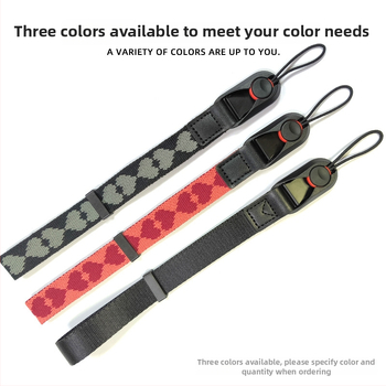 Kameros riešo diržas su širdies dizainu, greito atleidimo sagtis, reguliuojama; Medžiaga: susiūtas nailono juostos + mikropluošto oda; Modelis: paprastas greito atleidimo riešo dirželis; Maksimali apkrova: 50 kg; Tinka DSLR ir be veidrodinių kamerų