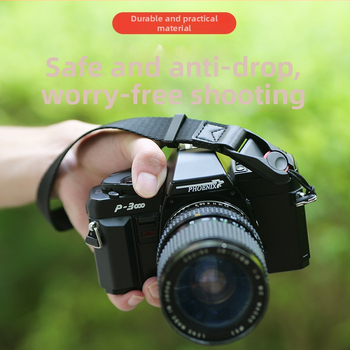 Kameros riešo diržas su širdies dizainu, greito atleidimo sagtis, reguliuojama; Medžiaga: susiūtas nailono juostos + mikropluošto oda; Modelis: paprastas greito atleidimo riešo dirželis; Maksimali apkrova: 50 kg; Tinka DSLR ir be veidrodinių kamerų