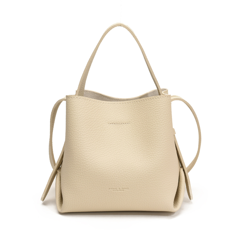 Ženska bucket torba, PU materijal, vertikalni kvadratni oblik, magnetsko zatvaranje, poliester podstava, unutarnji džep za telefon i džep s patentnim zatvaračem