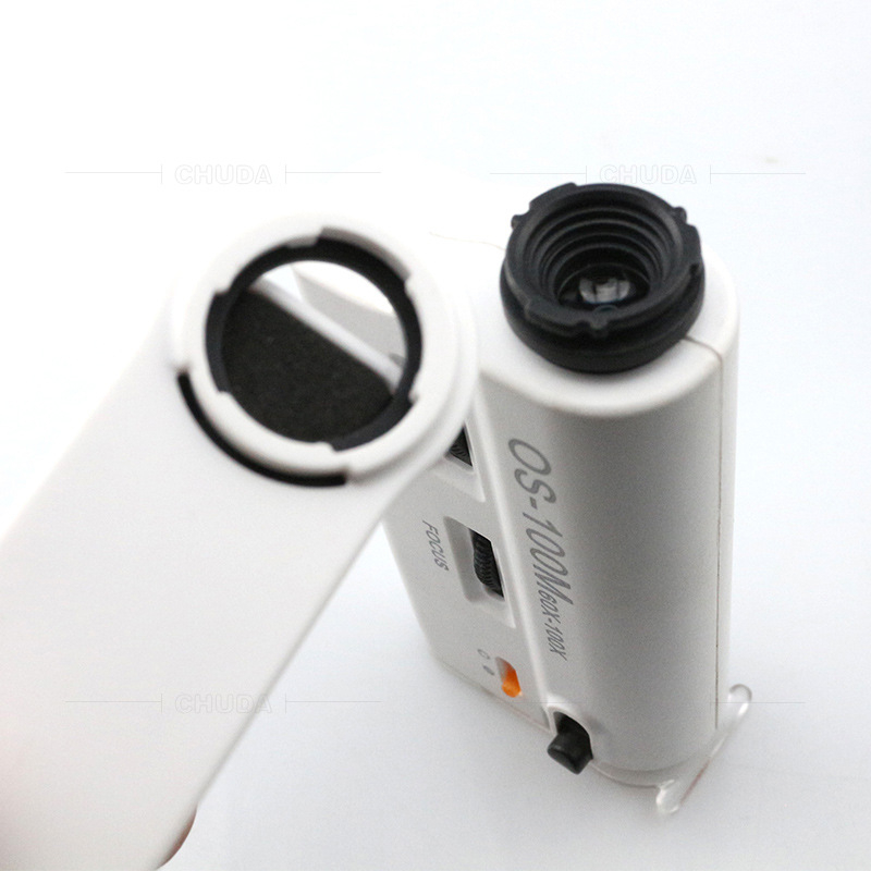 Chuda OS-100 ručni povećalo-mikroskop za identifikaciju nakita, 100x povećanje, LED/UV svjetlo, prozirni poklopac, materijal ABS/optička leća/metal