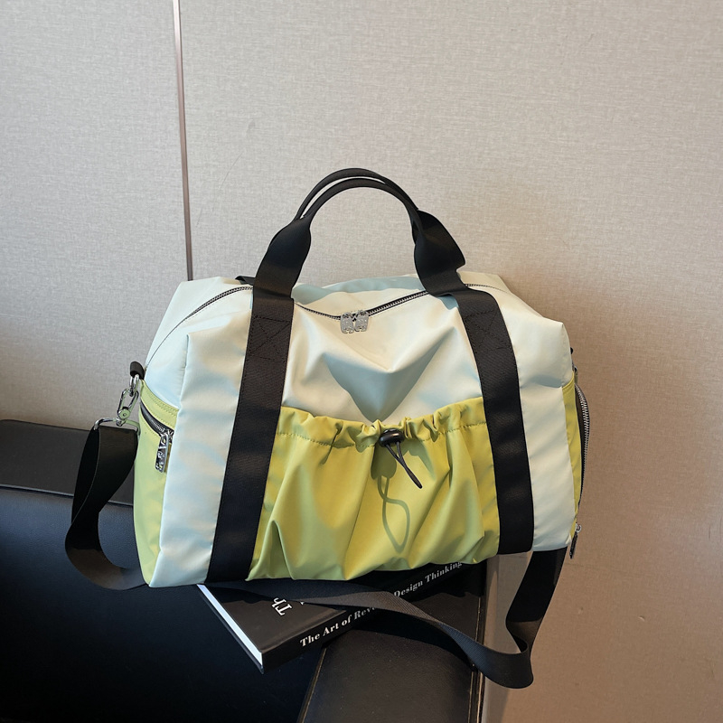 Geantă de călătorie impermeabilă unisex, cu curea crossbody, capacitate 20–35 L, material textil, ușoară