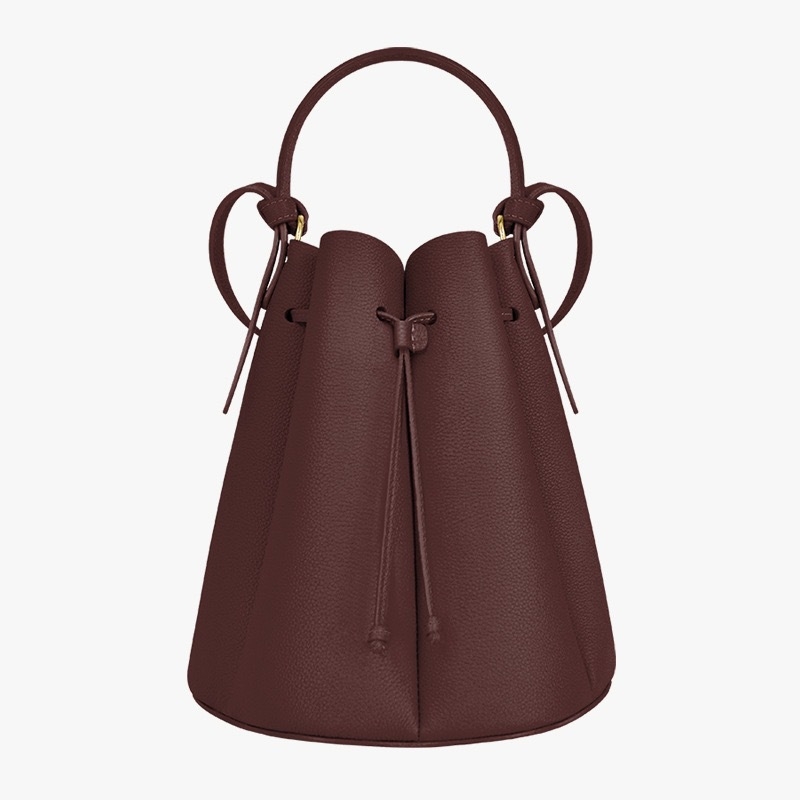 Valódi bőrből készült bucket bag húzózáras záródással, belső bélés tehenek bőréből és telefontokkal
