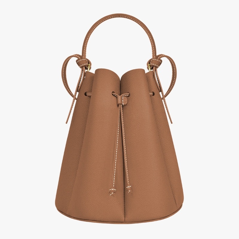 Valódi bőrből készült bucket bag húzózáras záródással, belső bélés tehenek bőréből és telefontokkal