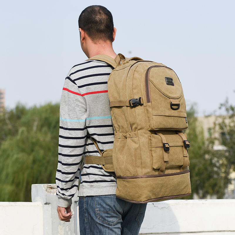 Rucsac din pânză, capacitate 20–35 L, unisex, curele curbate, compatibil cu laptop de 14 inchi, rezistent la uzură.