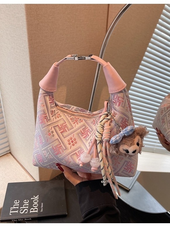 Geantă de damă în stil național Zhuang Brocade — din pânză, formă dumpling-type, închidere cu fermoar, buzunar interior laminat, căptușeală din poliester