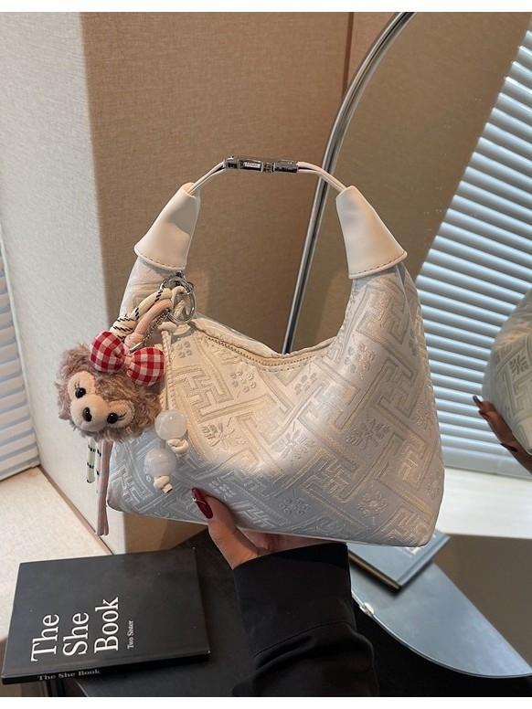 Geantă de damă în stil național Zhuang Brocade — din pânză, formă dumpling-type, închidere cu fermoar, buzunar interior laminat, căptușeală din poliester