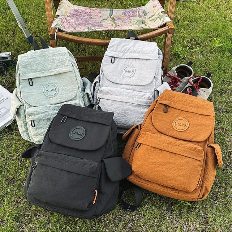 Vonkajší turistický batoh, 36–55L, nylon, zakrivené ramenné popruhy, kompatibilný s 8-palcovým notebookom, odolný voči oderu