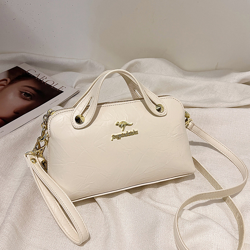 PU dámska crossbody taška – vertikálne štvorcový tvar, zapínanie na zips, polyesterová podšívka, vnútorná kapsa so zipsom