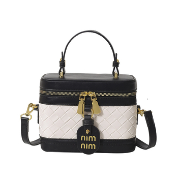 PU anyagú vödör táska fedéllel, városi minimalist design, vízszintes négyzetes forma, cipzáras zárás, belső zseb a telefon számára, egy vállpánt, mindennapi használatra