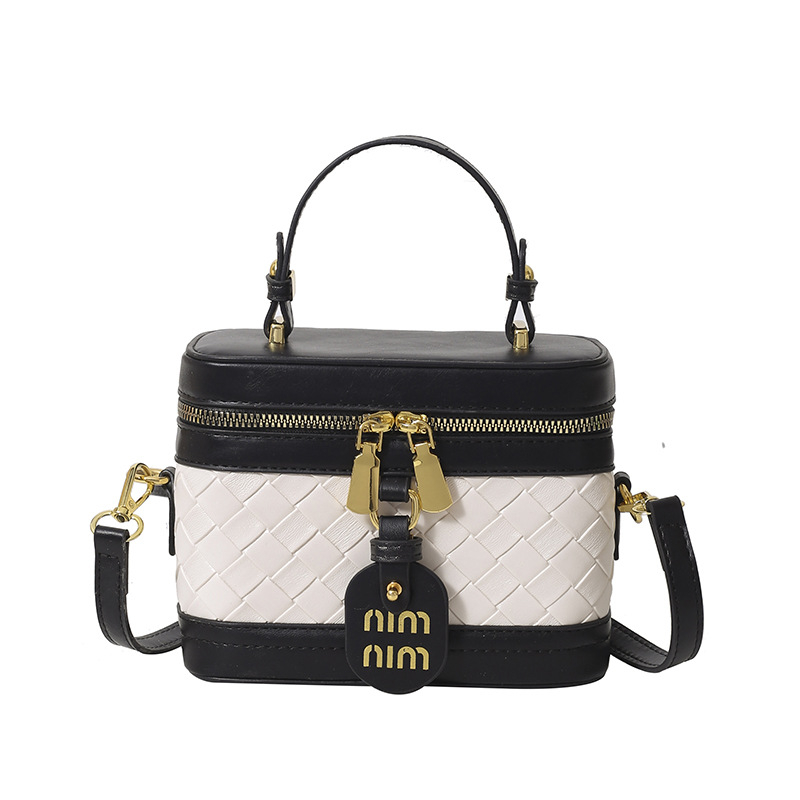 PU anyagú vödör táska fedéllel, városi minimalist design, vízszintes négyzetes forma, cipzáras zárás, belső zseb a telefon számára, egy vállpánt, mindennapi használatra